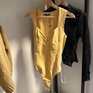 Yellow body suit